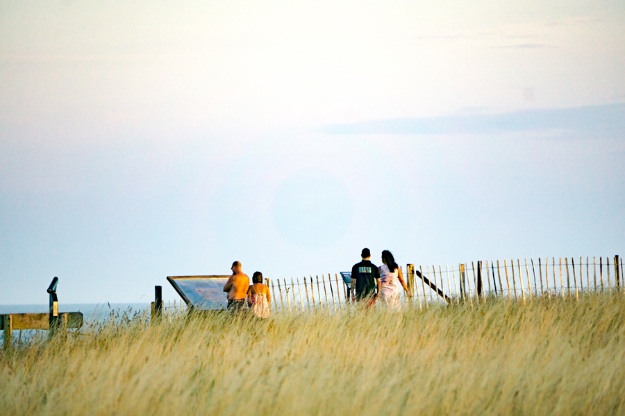 People taking in the view, Mersea Island